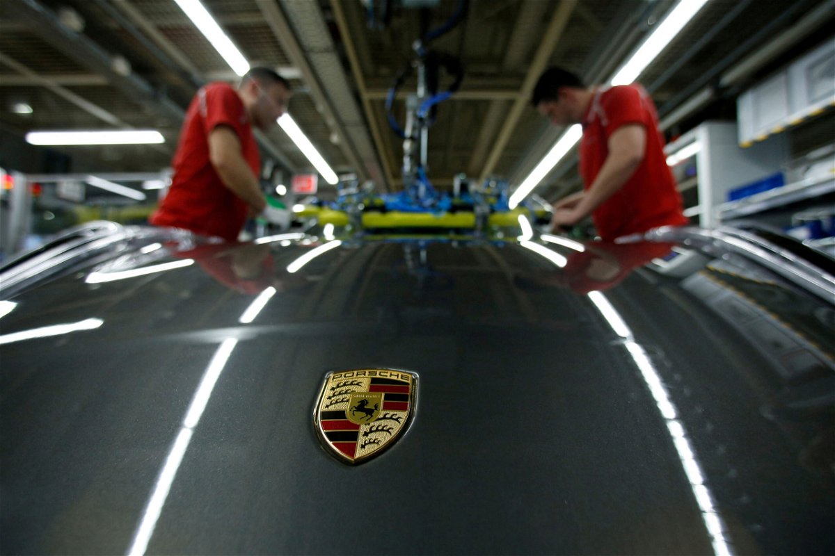 <i>Ralph Orlowski/Reuters</i><br/>Employees of German car manufacturer Porsche are seen here at the Porsche factory in Stuttgart-Zuffenhausen