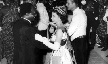 Queen Elizabeth II dances with President Kwame Nkrumah of Ghana