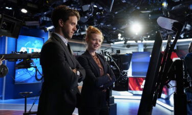 Ashley Zukerman and Sarah Snook on the set of ATN in "Succession."