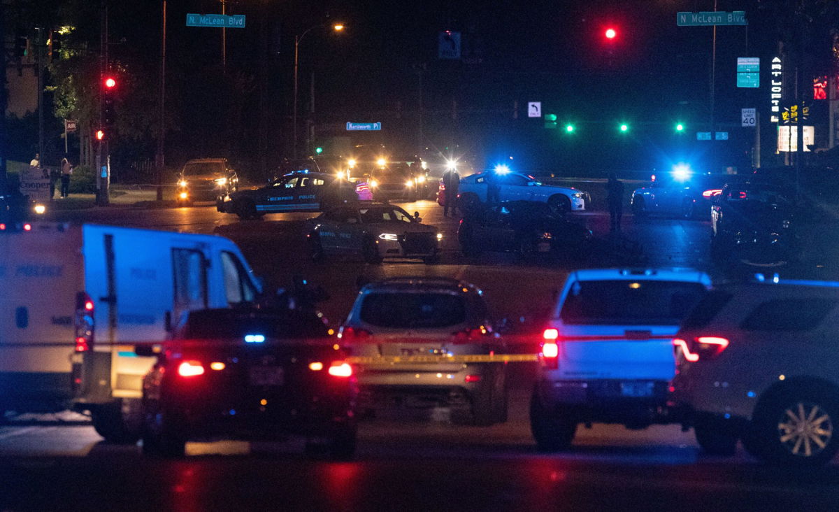 <i>Christine Tannous/The Commercial Appeal/USA Today Network</i><br/>Memphis police officers work the scene of a shooting MPD believes was committed by a man driving around shooting on September 7.