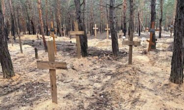 Ukrainian authorities have found 440 graves at a mass burial site in Izium