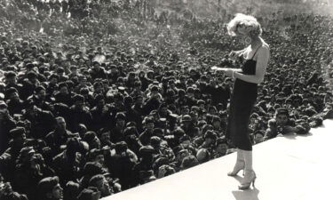 Marilyn Monroe signs an autograph for a US serviceman in Korea as part of the USO program.