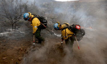 Light rain and higher humidity gave firefighters a chance to get more containment around the Fairview Fire