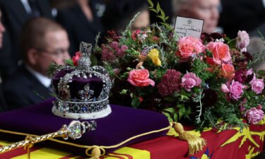 Queen Elizabeth II's coffin is carried on the day of the state funeral in London.