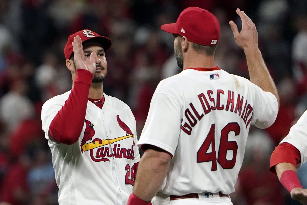 St. Louis Cardinals' Nolan Arenado, left, and Paul Goldschmidt celebrate as 2-1 victory over the Pittsburgh Pirates in a baseball game Friday, Sept. 30, 2022, in St. Louis. 