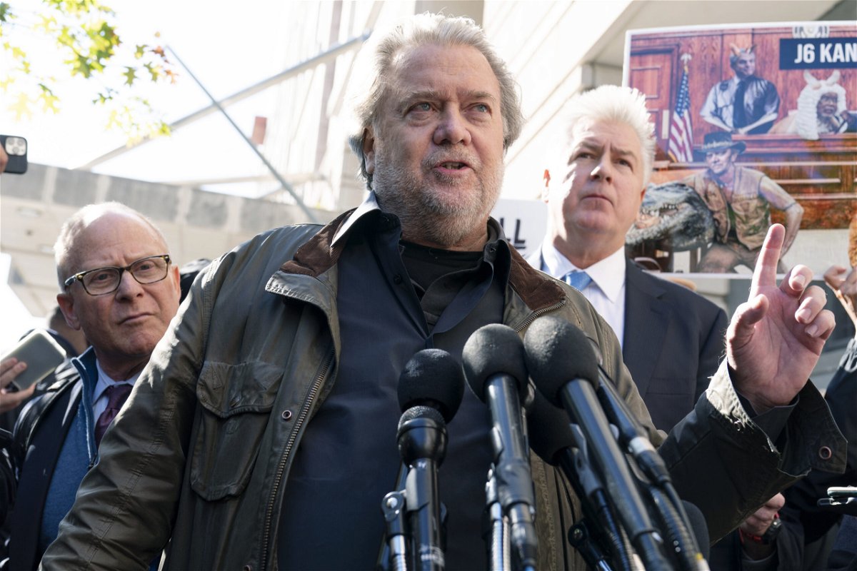 Steve Bannon, center, a longtime ally of former President Donald Trump and convicted of contempt of Congress,  accompanied by his attorneys David Schoen, left, and Evan Corcoran, right, speaks to the media as he leaves the federal courthouse on Friday, Oct. 21, 2022, in Washington. Bannon was sentenced to 4 months behind bars for defying a Jan. 6 committee subpoena. 