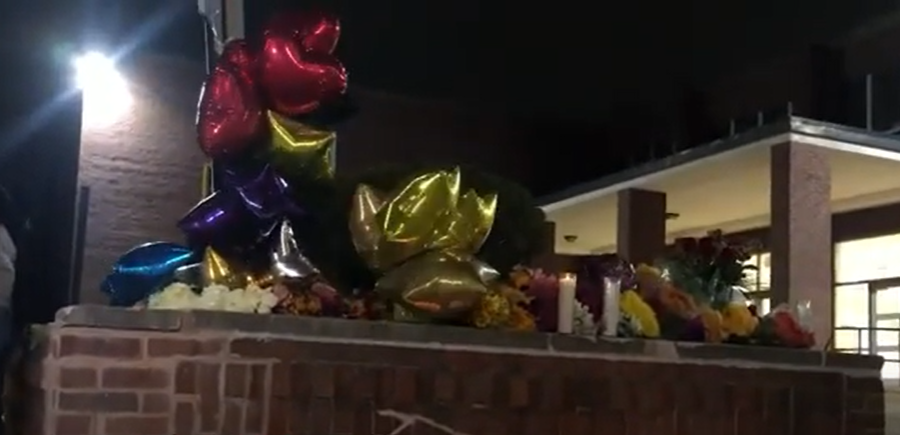 A memorial was made for the victims of a school shooting at Central Visual and Performing Arts High School. A vigil was held Monday night for the victims.
