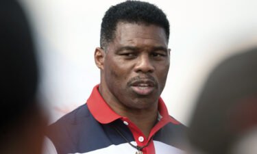 A woman who claims she was in a years-long romantic relationship with Georgia Republican Senate Candidate Herschel Walker pictured on October 11