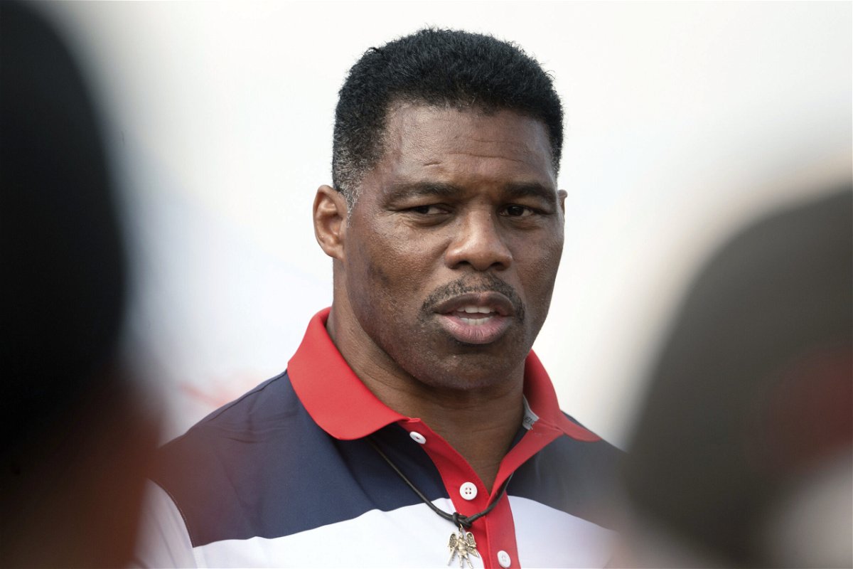 <i>Megan Varner/AP</i><br/>A woman who claims she was in a years-long romantic relationship with Georgia Republican Senate Candidate Herschel Walker pictured on October 11