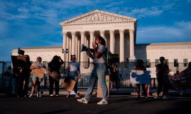 Abortion rights activists participate in an impromptu demonstration outside of the the U.S. Supreme Court in Washington