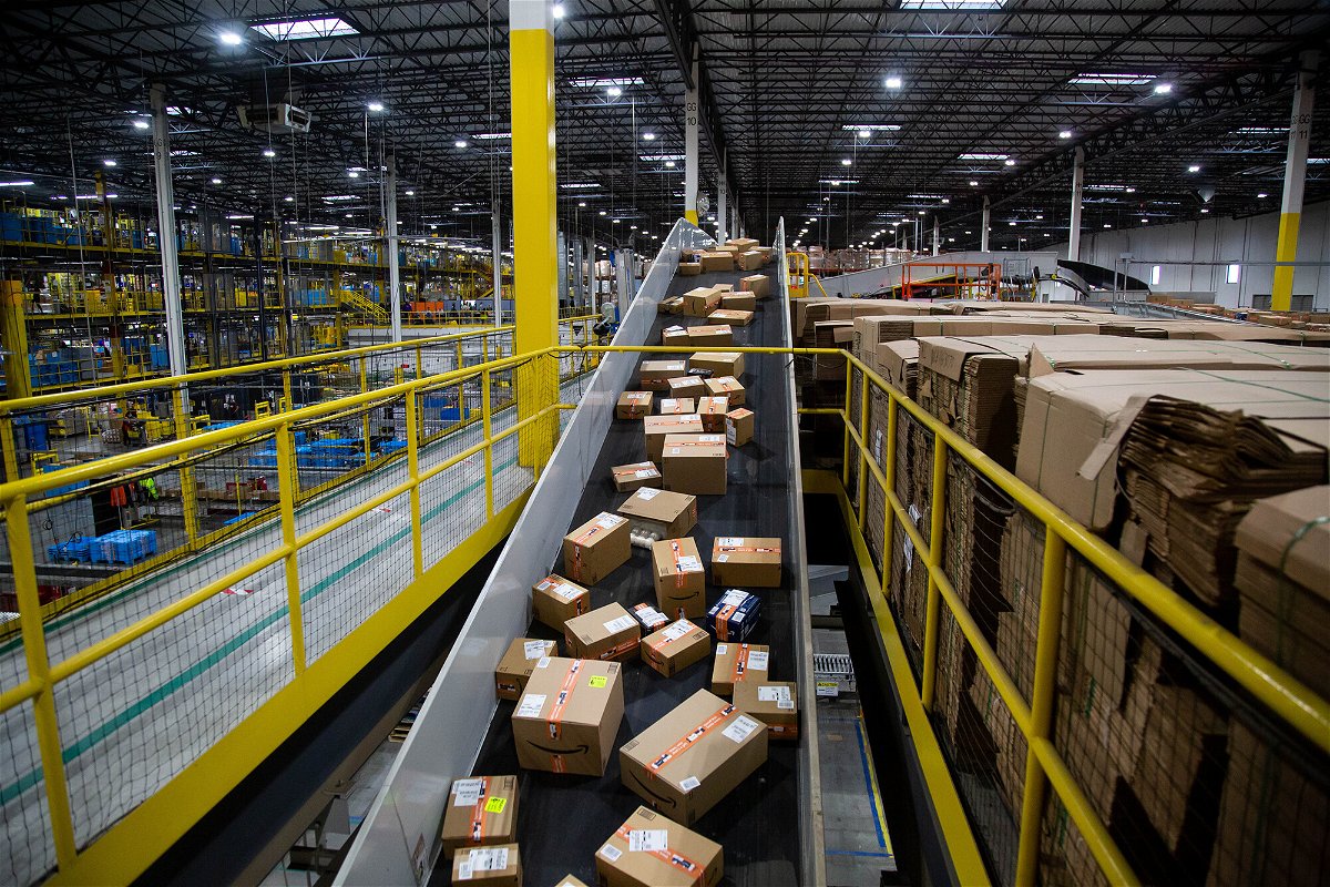 <i>Michael Nagle/Bloomberg/Getty Images</i><br/>Packages move along a conveyor at an Amazon fulfillment center on Cyber Monday in Robbinsville