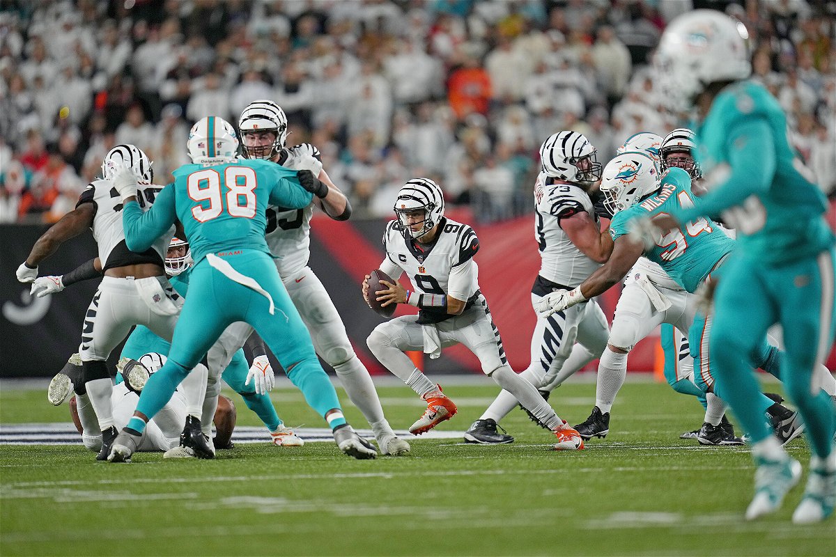 <i>Sam Greene/USA TODAY Sports/Reuters</i><br/>Joe Burrow runs with the ball in the second quarter against the Miami Dolphins.