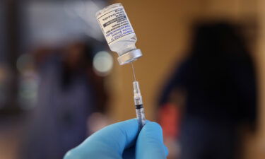 A pharmacist prepares to administer Covid-19 vaccine booster shots on September 09