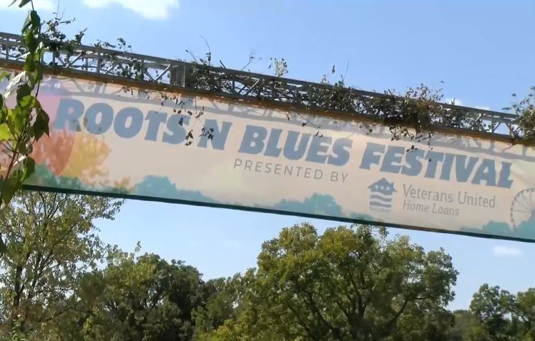 A sign welcomes people at the gate of the Roots N Blues Festival.