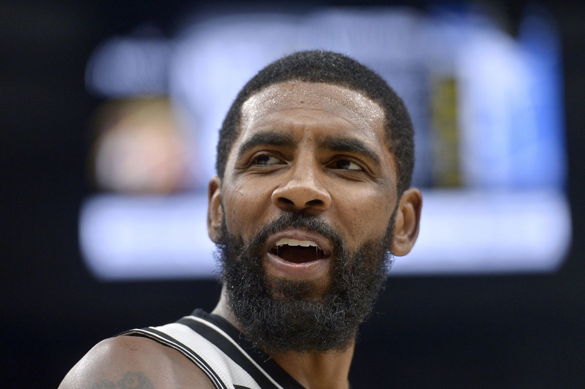 FILE - Brooklyn Nets guard Kyrie Irving reacts in the second half of an NBA basketball game against the Memphis Grizzlies on Monday, Oct. 24, 2022, in Memphis, Tenn. The Nets suspended Kyrie Irving for at least five games without pay Thursday, Nov. 3, 2022, dismayed by his repeated failure to “unequivocally say he has no antisemitic beliefs.”