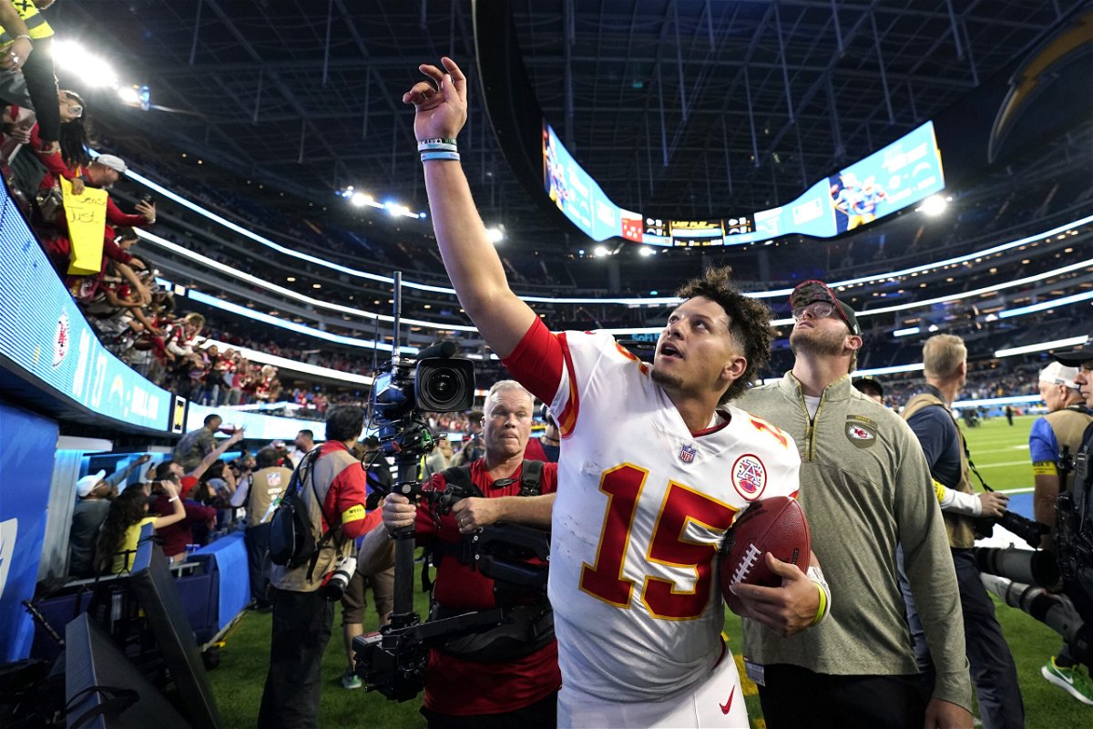 Kansas City Chiefs quarterback Patrick Mahomes celebrates with fans after the Chiefs defeated the Los Angeles Chargers 30-27 in an NFL football game Sunday, Nov. 20, 2022, in Inglewood, Calif.