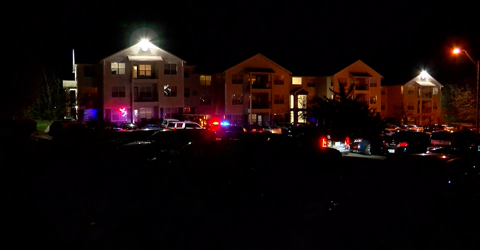 Police arrive to the parking lot of The Quarters apartment complex in south Columbia on Thursday night.