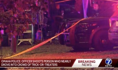 The Omaha Police Department confirms an officer shot a driver who nearly hit a huge crowd of Halloween trick-or-treaters near Minne Lusa Boulevard and Newport Avenue.