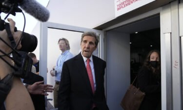 US climate envoy John Kerry arrives for a panel on biodiversity at the UN climate summit on Wednesday.