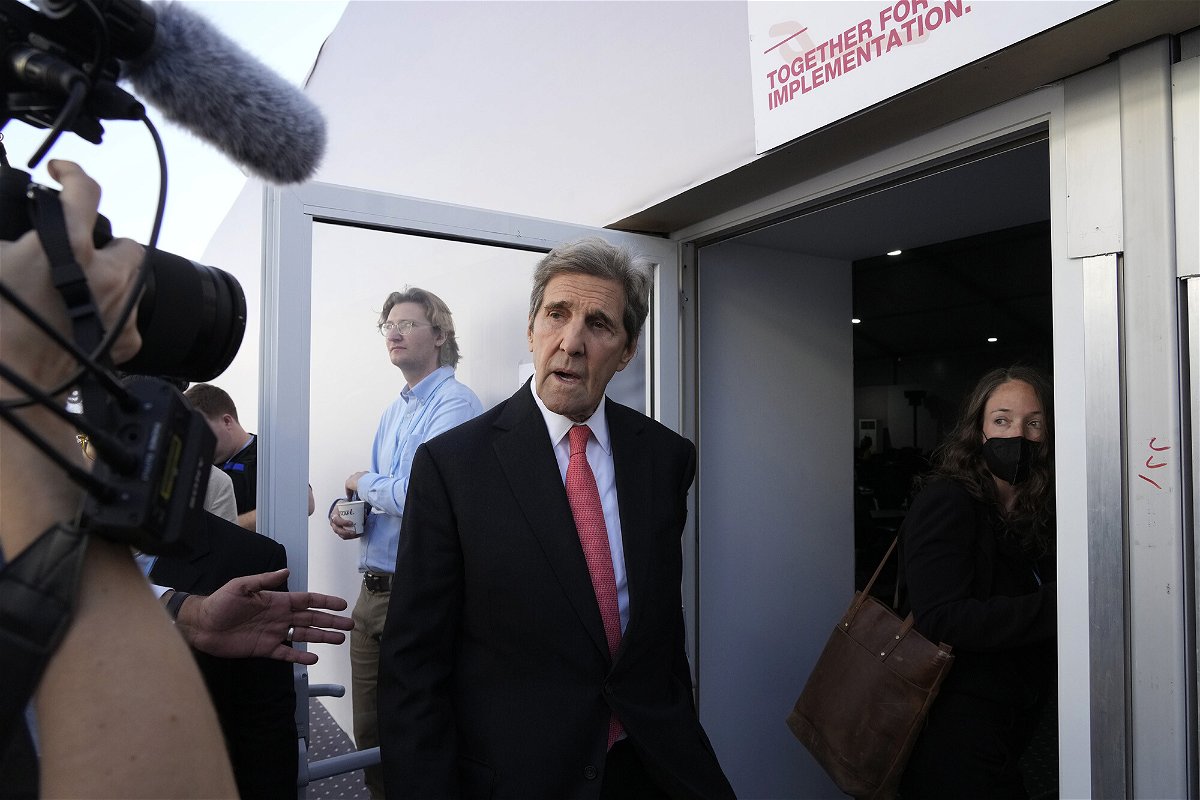 <i>Peter Dejong/AP</i><br/>US climate envoy John Kerry arrives for a panel on biodiversity at the UN climate summit on Wednesday.