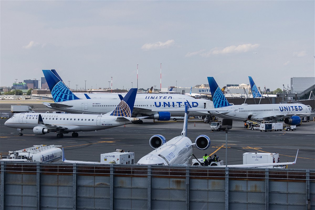 <i>Jeenah Moon/Getty Images</i><br/>United Airlines aircrafts are seen at Newark Liberty International Airport (EWR) on July 1. A shortage of airline pilots is leading pilots at America's largest carriers to push for better pay and benefits.