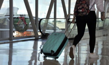 A traveler traverses the skywalk at Baltimore/Washington International Airport November 21.