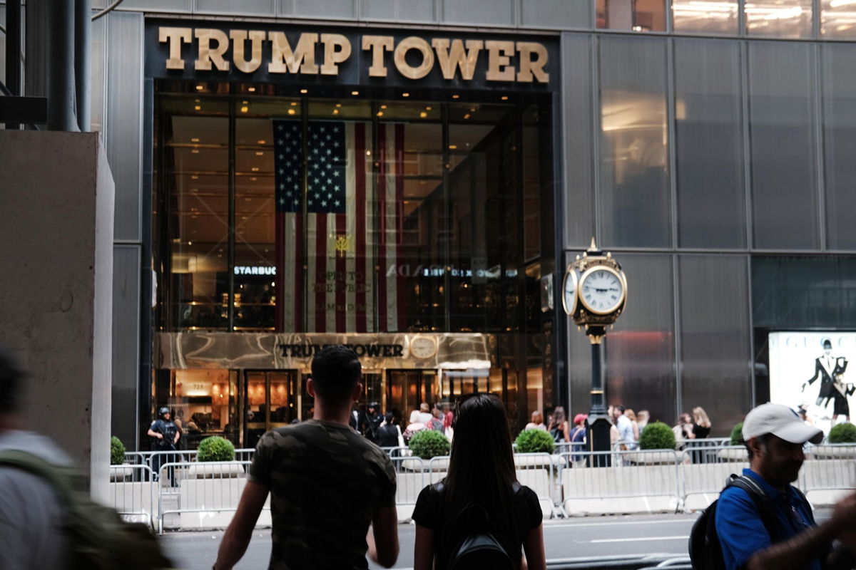 <i>Spencer Platt/Getty Images</i><br/>Former President Donald Trump and his company settled a lawsuit alleging his security assaulted a group of men protesting Trump's rhetoric outside of Trump Tower in 2015