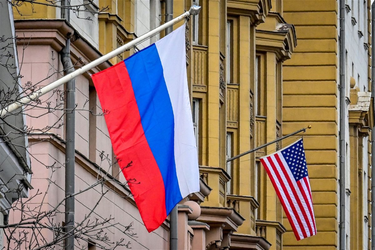 <i>Yuri Kadobnov/AFP/Getty Images</i><br/>Russia postpones nuclear arms control talks with the United States. A Russian flag flies next to the US embassy building in Moscow on March 18