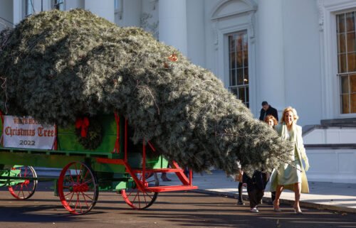First lady Jill Biden receives the official 2022 White House Christmas Tree at the White House in Washington