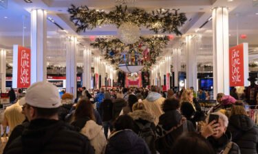 People shop at Macy's department store during Black Friday in New York City on November 25. American consumers got holiday shopping off to a strong start.