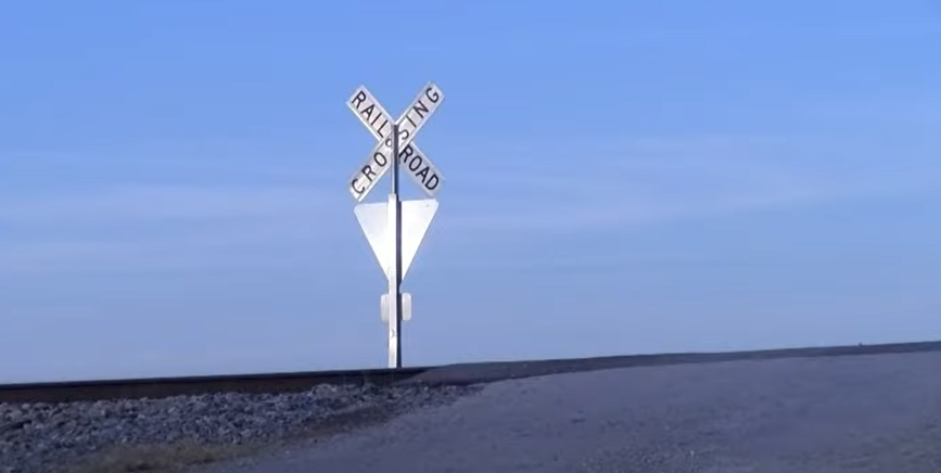 File photo of a crossbucks sign and yield sign at a passive railroad crossing in Missouri.