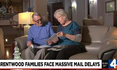 Alan Taylor and his wife Roxane looked through their pile of mail Friday afternoon after not receiving it for days.