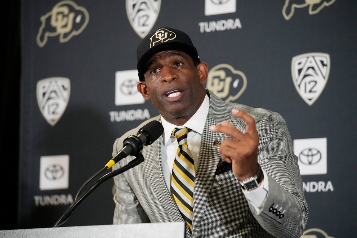 <i>David Zalubowski/AP</i><br/>Deion Sanders speaks after being introduced as the new head football coach at the University of Colorado.