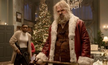 'Violent Night' delivers the goods by putting Santa Claus in 'Die Hard' mode. Alexis Louder and David Harbour are pictured here in the action-comedy.