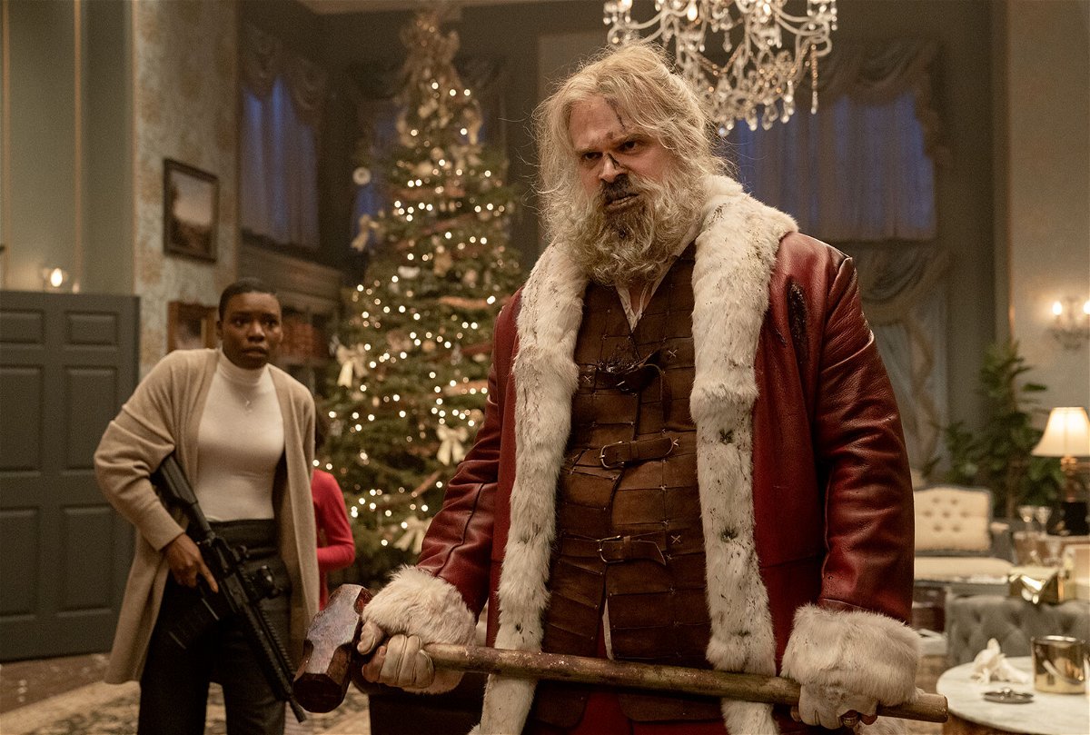 <i>Allen Fraser/Universal Pictures</i><br/>'Violent Night' delivers the goods by putting Santa Claus in 'Die Hard' mode. Alexis Louder and David Harbour are pictured here in the action-comedy.