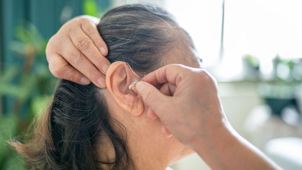 <i>Su Arslanoglu/E+/Getty Images</i><br/>Wearing hearing aids may lower your risk for cognitive decline and dementia