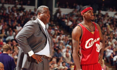 (From left to right) Head coach Paul Silas and LeBron James of the Cleveland Cavaliers look on during the game against the Sacramento Kings at Arco Arena on October 29