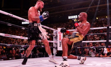 Jake Paul knocks down Anderson Silva during their cruiserweight bout at Desert Diamond Arena on October 29 in Glendale