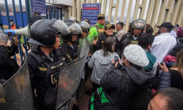 Police guard the entrance to the Alejandro Velasco Astete International Airport