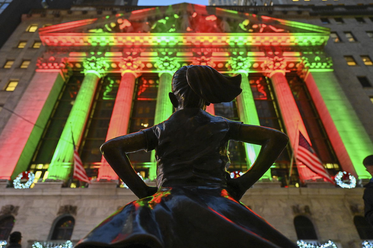 <i>NDZ/STAR MAX/IPx/AP</i><br/>US stocks surged higher Thursday morning. The Fearless Girl statue stands in front of the New York Stock Exchange on December 2