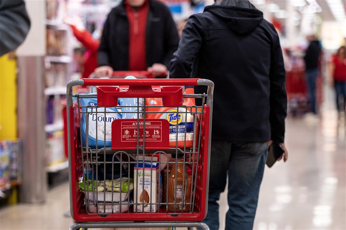 <i>Christopher Dilts/Bloomberg/Getty Images</i><br/>Consumers are feeling slightly better about the direction of the economy. A customer pushes a shopping cart at a Target store on Black Friday in Chicago