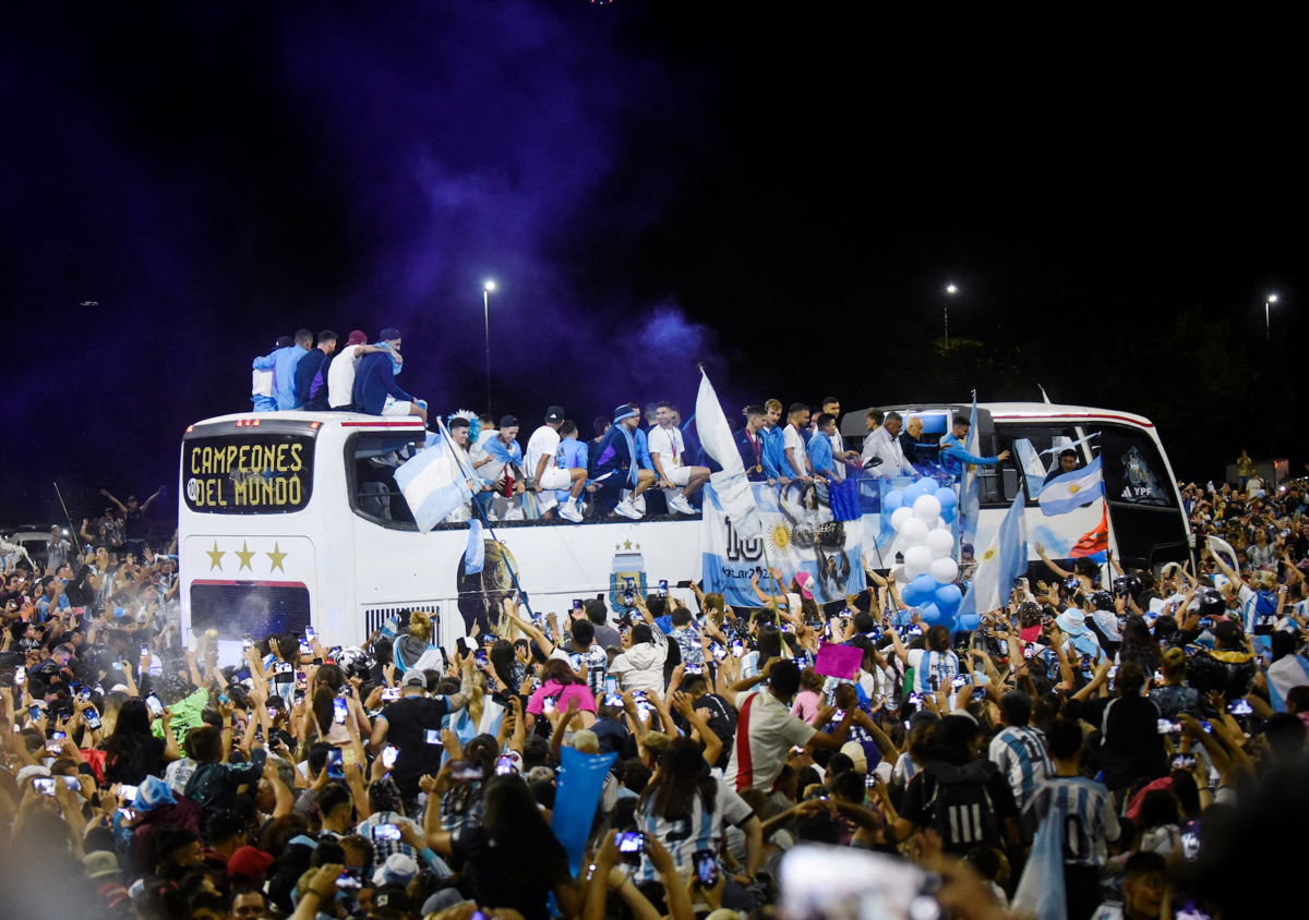 <i>Mariana Nedelcu/Reuters</i><br/>The Argentina football team on a bus in Buenos Aires on December 20