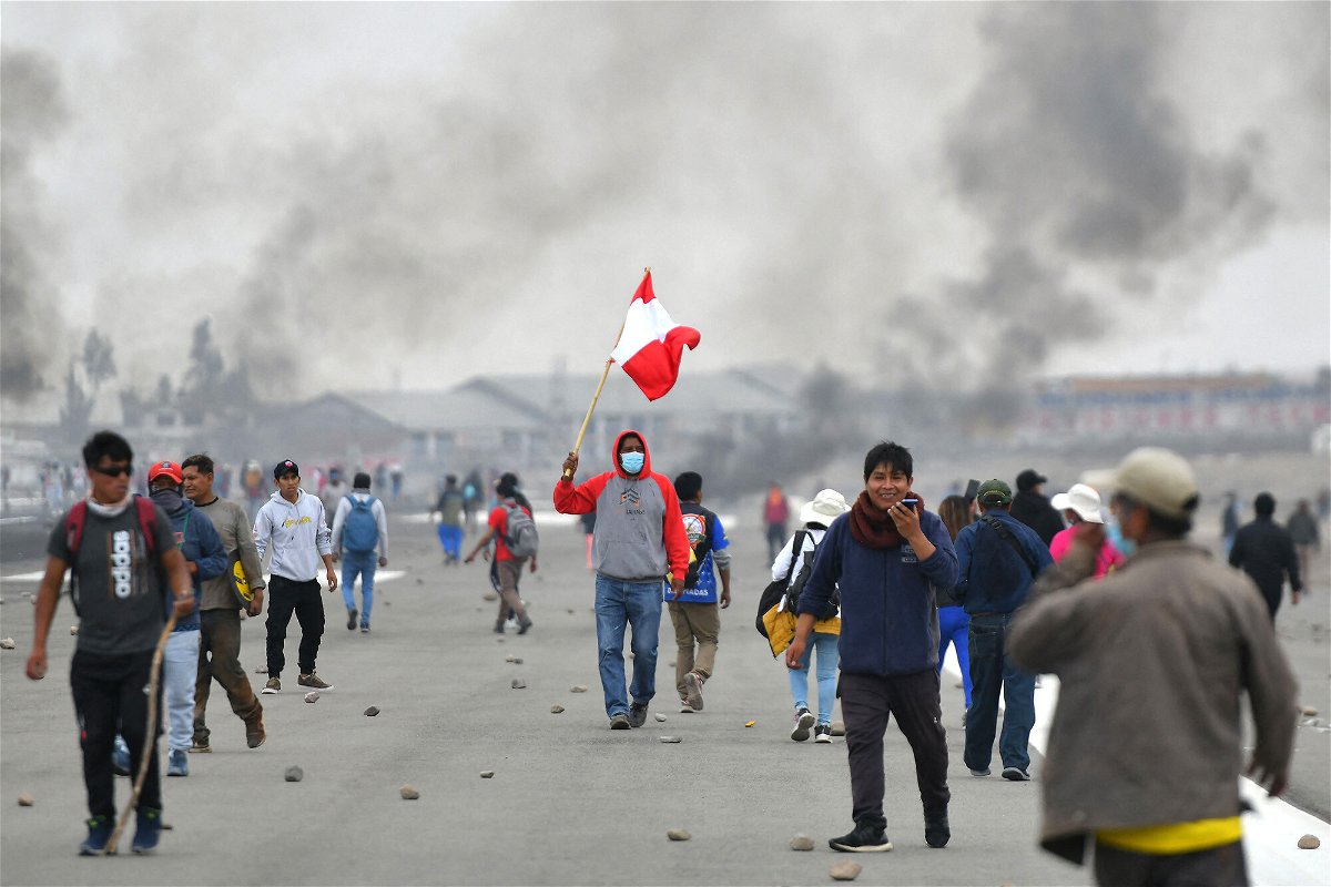 <i>Diego Ramos/AFP/Getty Images</i><br/>Protestors at the Alfredo Rodriguez Ballon international airport in Arequipa on Monday.