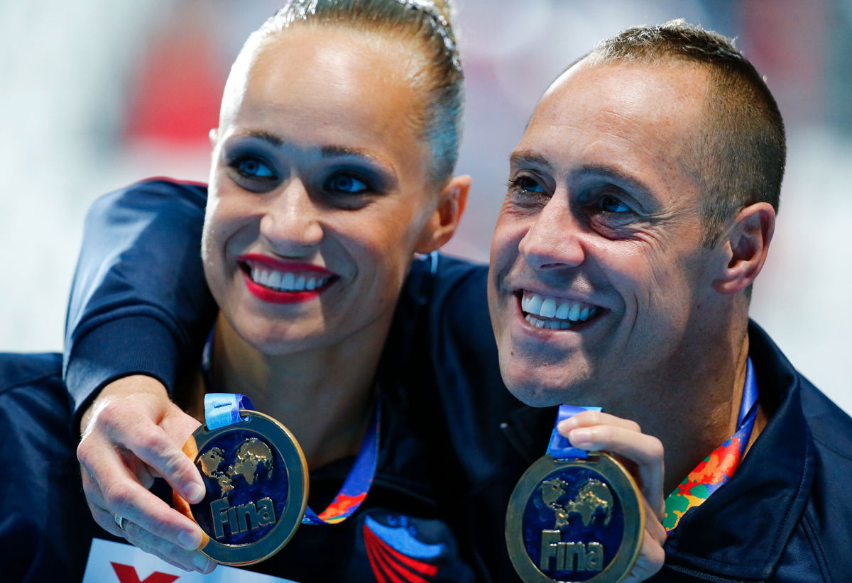 <i>Michael Dalder/Reuters</i><br/>Christina Jones and Bill May of the US pose with their gold medals after the synchronised swimming mixed duet technical final at the Aquatics World Championships in Kazan