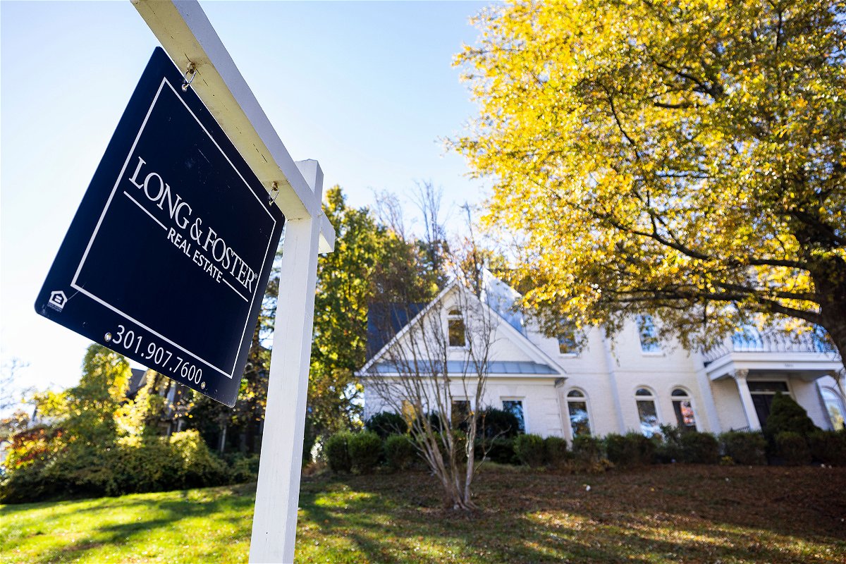 <i>Jim Lo Scalzo/EPA-EFE/Shutterstock</i><br/>A real estate sign is seen here outside a single-family home in Bethesda
