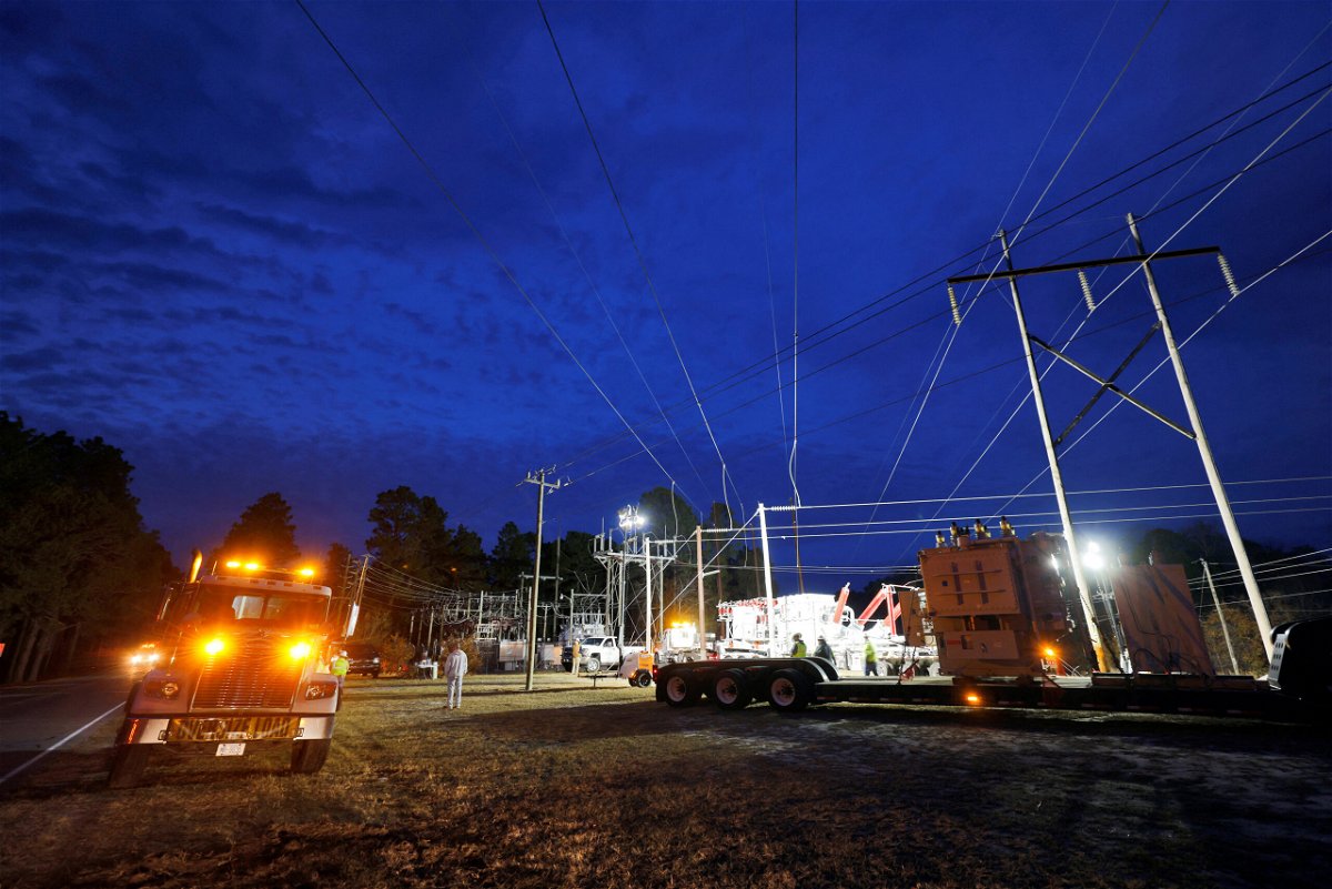 <i>Jonathan Drake/Reuters</i><br/>Duke Energy personnel work to restore power at a crippled electrical substation that was attacked over the weekend in North Carolina. US officials have been concerned about such attacks by domestic extremists for years.
