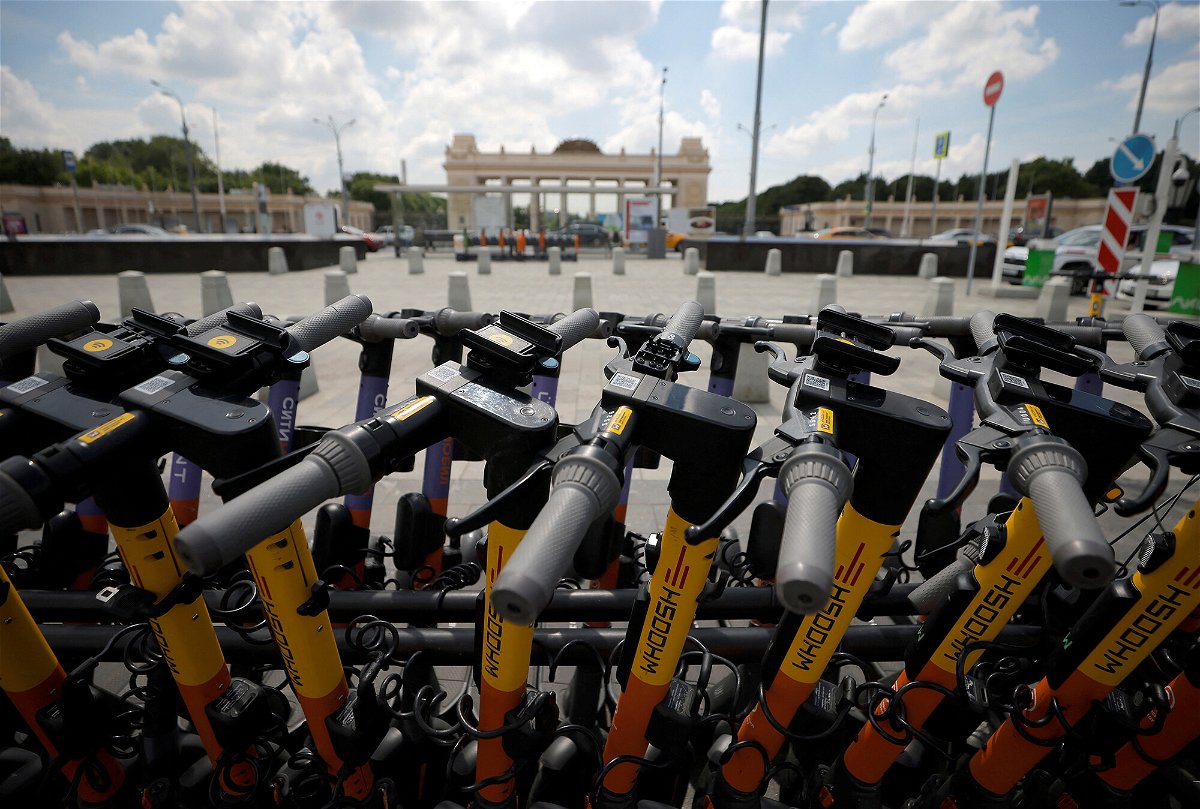 <i>Maxim Shemetov/Russia/Reuters</i><br/>Electric scooter service Whoosh just became the only company to pull off an initial public offering in Russia this year. Electric scooters are parked at a station in Moscow in June 2021.