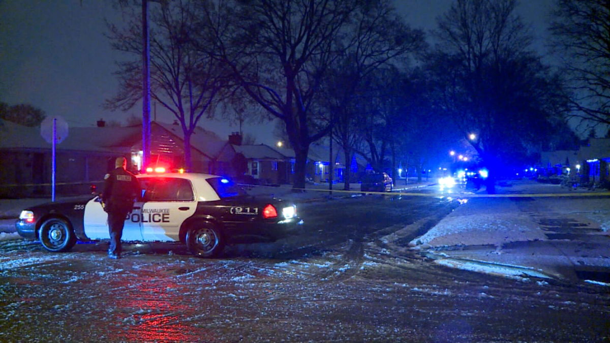 <i>WDJT</i><br/>Police secure the scene where a mail carrier was shot to death Friday evening in Milwaukee.
