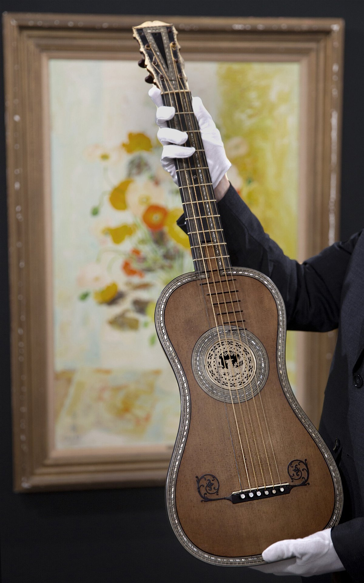 <i>Aguttes Auction House</i><br/>The guitar was created by Jacques-Philippe Michelot in Paris.