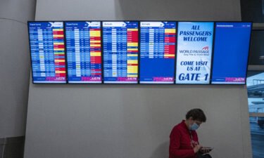 Cancelled Southwest Airlines flights are displayed on an information board at California's Oakland International Airport on Tuesday.